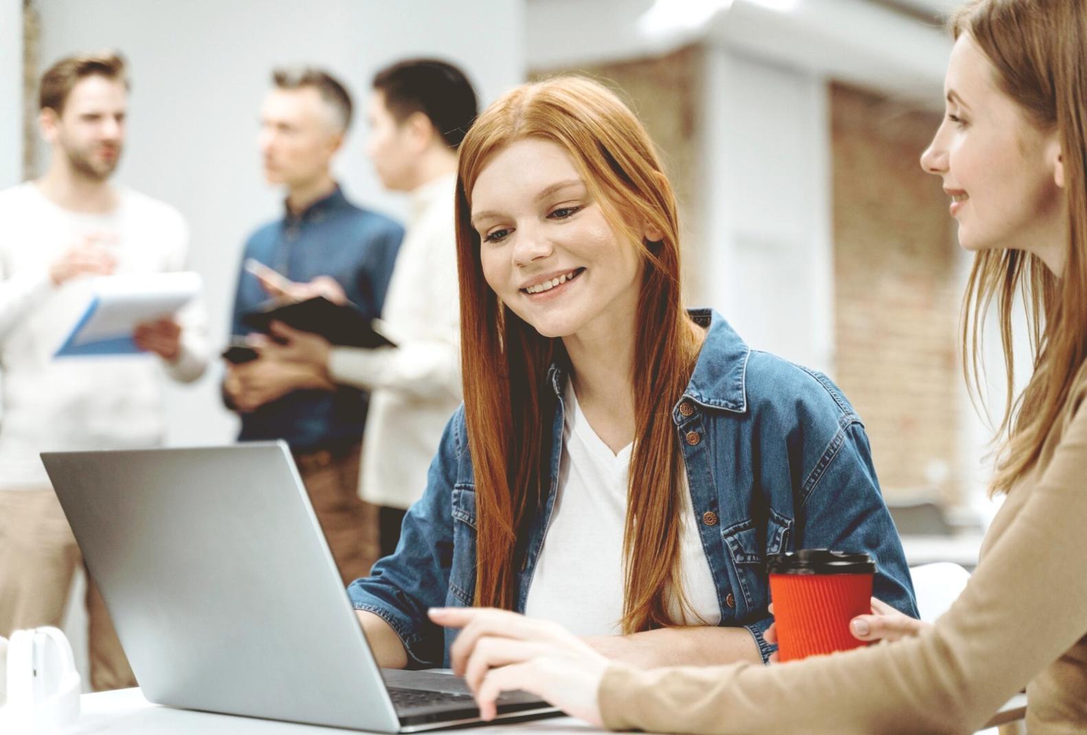 Student reviewing investment portfolio analysis with detailed charts